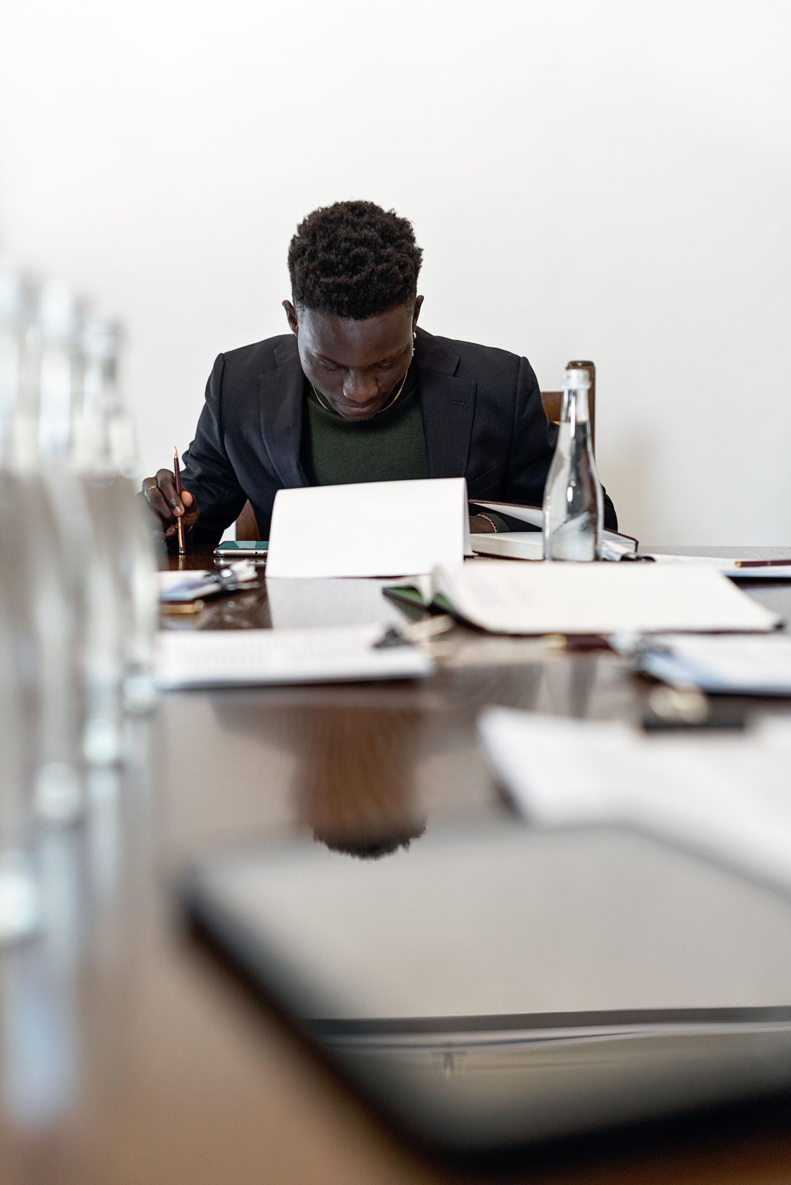 Business owner reviewing documents while starting an Arizona LLC
