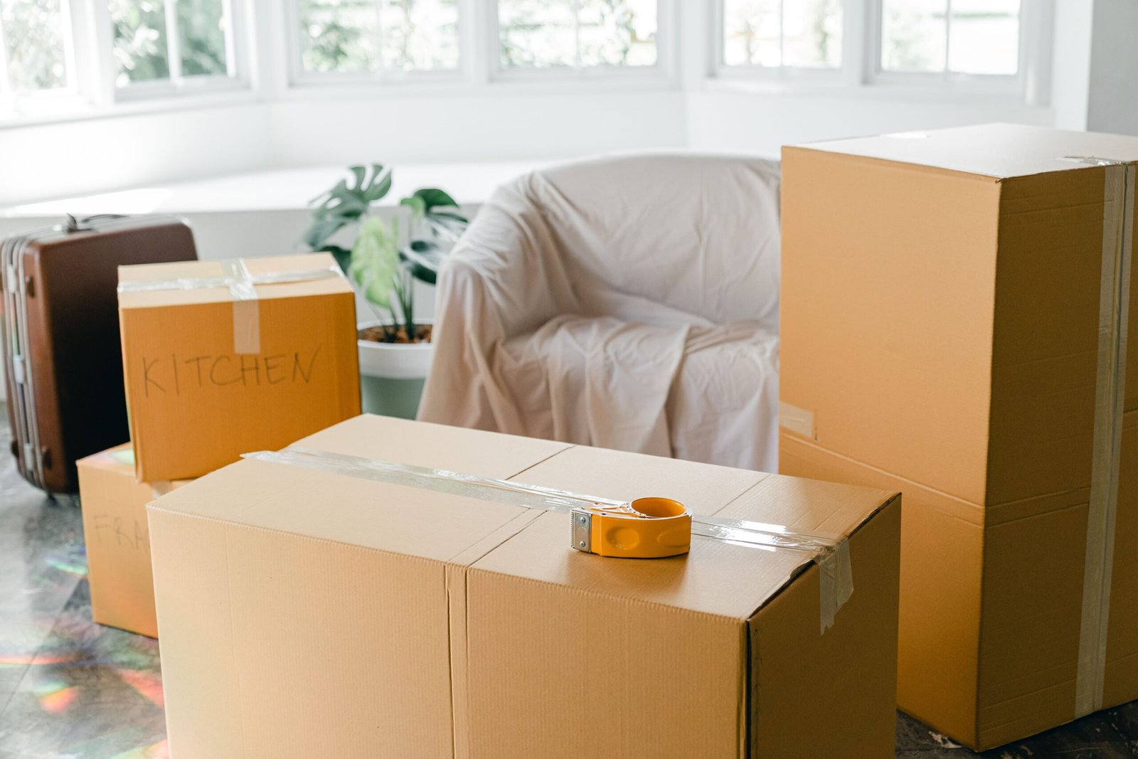 Moving boxes in a rental home for an Arizona security deposit article