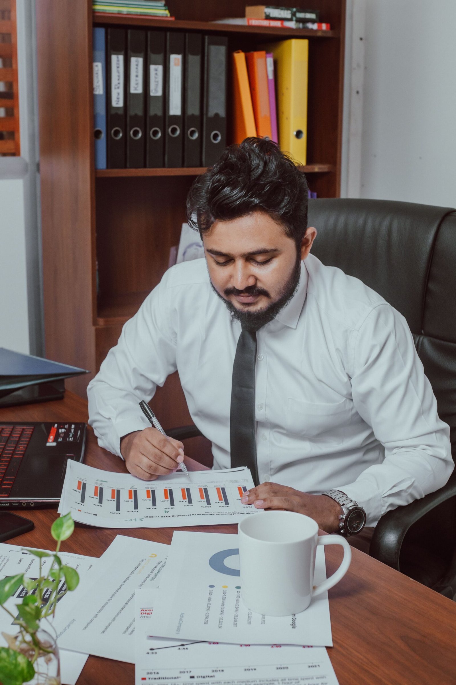 Professional reviewing financial documents in an office for a Texas final paycheck article