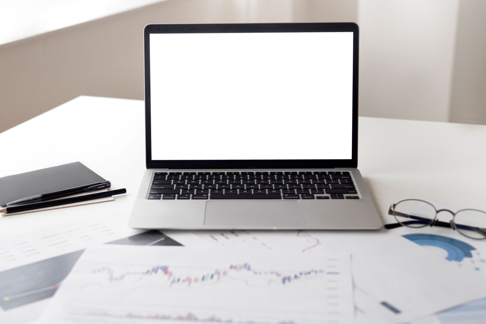 Laptop and financial documents used for an online money search